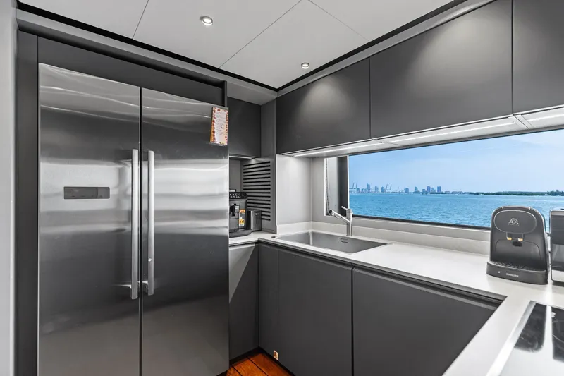 Slide: The Image of Modern kitchen interior on 2023 Wally WHY 150 yacht with ocean view. - 61