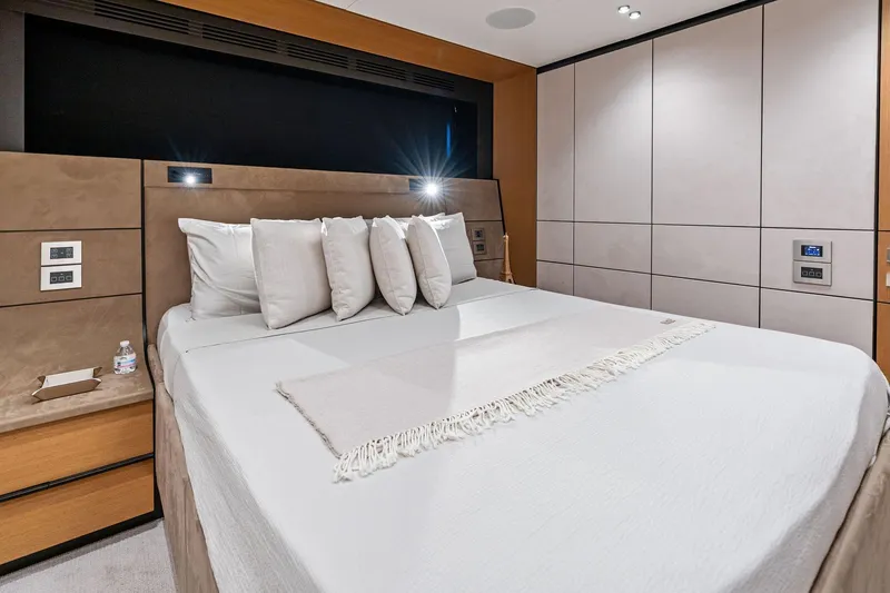 Slide: The Image of Luxurious bedroom interior on 2023 Wally WHY 150 yacht, featuring modern design and plush bedding. - 69