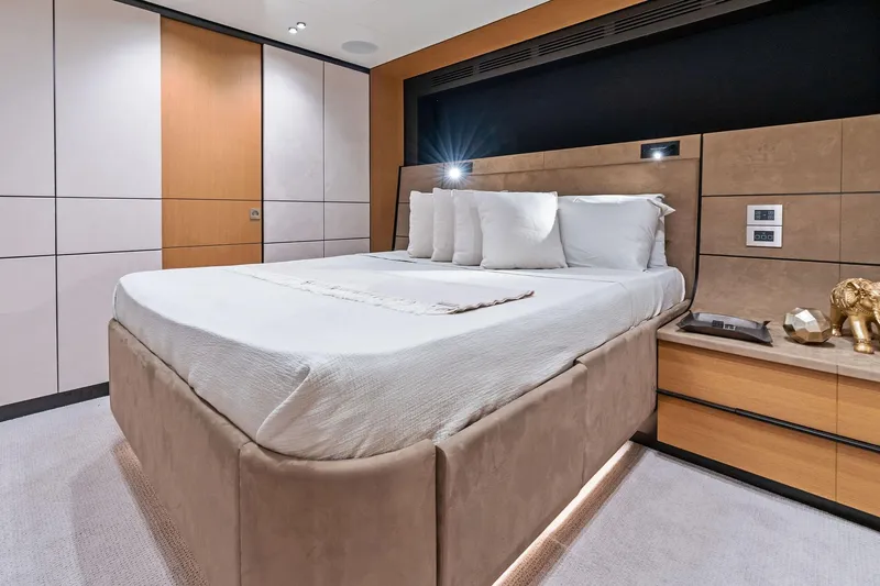 Slide: The Image of Luxurious bedroom interior of 2023 Wally WHY 150 yacht with modern design and elegant decor. - 74