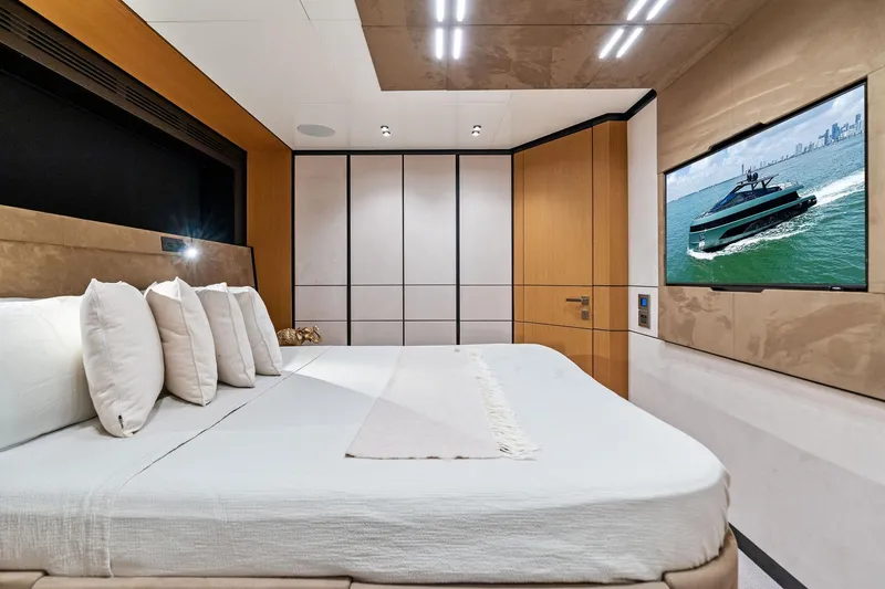 Slide: The Image of Luxurious bedroom interior on 2023 Wally WHY 150 yacht with modern design and TV display. - 76