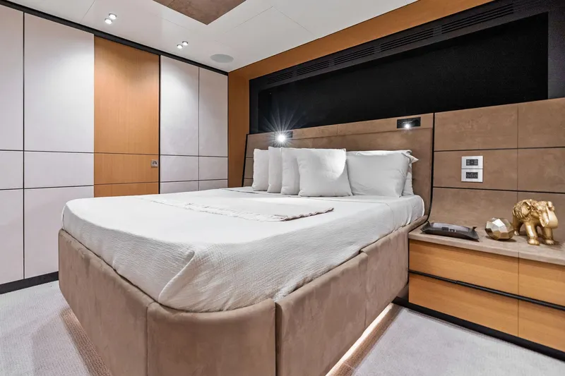 Slide: The Image of Luxurious bedroom interior of 2023 Wally WHY 150 yacht with modern design elements. - 79