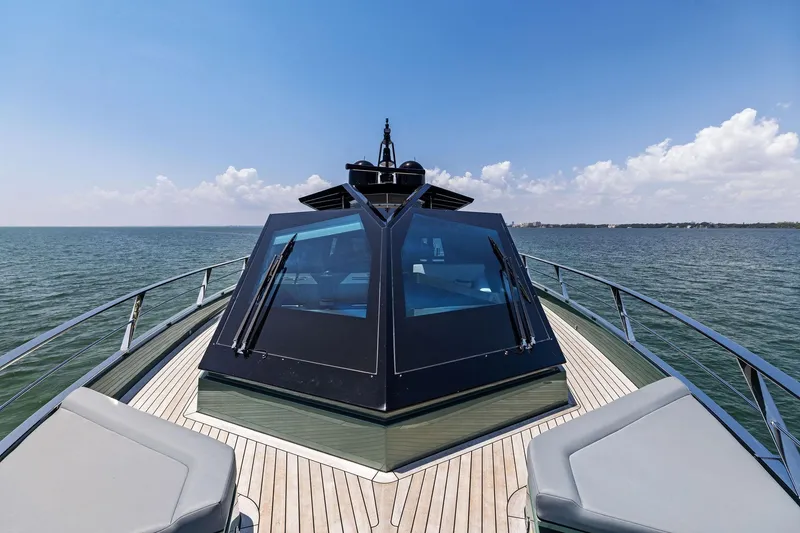 Slide: The Image of Luxurious 2023 Wally WHY 150 yacht deck with sleek design and ocean view. - 8