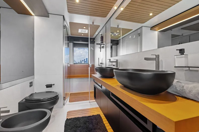 Slide: The Image of Luxurious bathroom interior on 2023 Wally WHY 150 yacht, featuring modern fixtures and elegant design. - 94