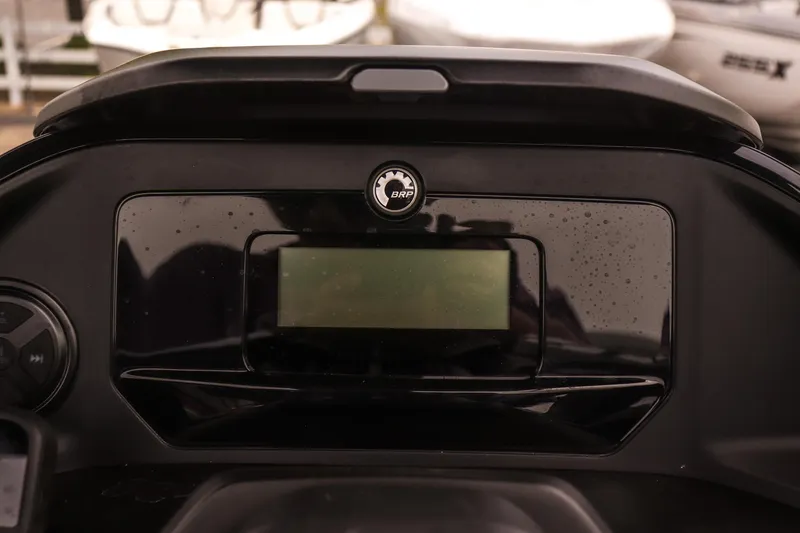 Slide: The Image of Dashboard of 2025 Sea-Doo Switch Fish 18-230 HP with BRP logo. - 11