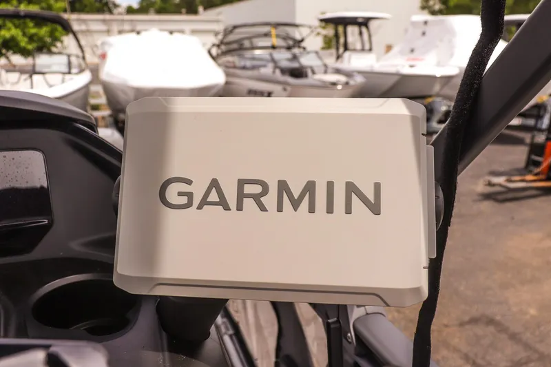 Slide: The Image of Garmin device on 2025 Sea-Doo Switch Fish 18-230 HP boat, surrounded by other boats. - 12