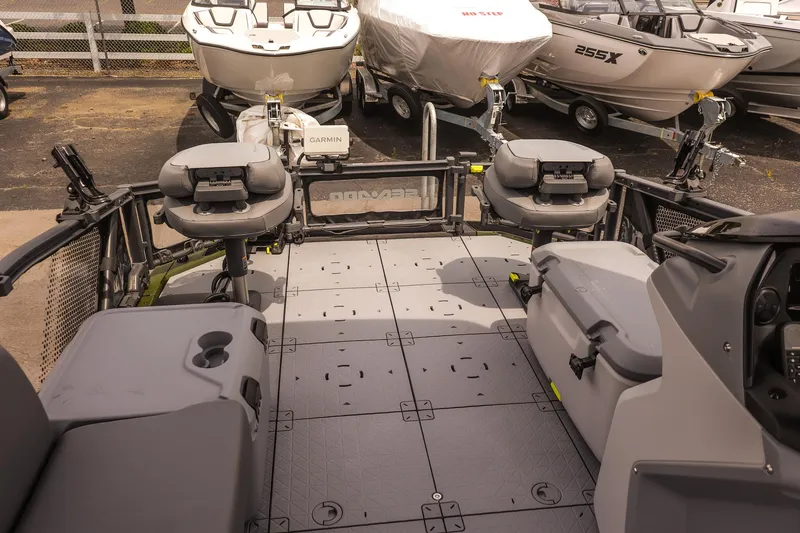 Slide: The Image of 2025 Sea-Doo Switch Fish 18-230 HP deck with seating and fishing equipment. - 15