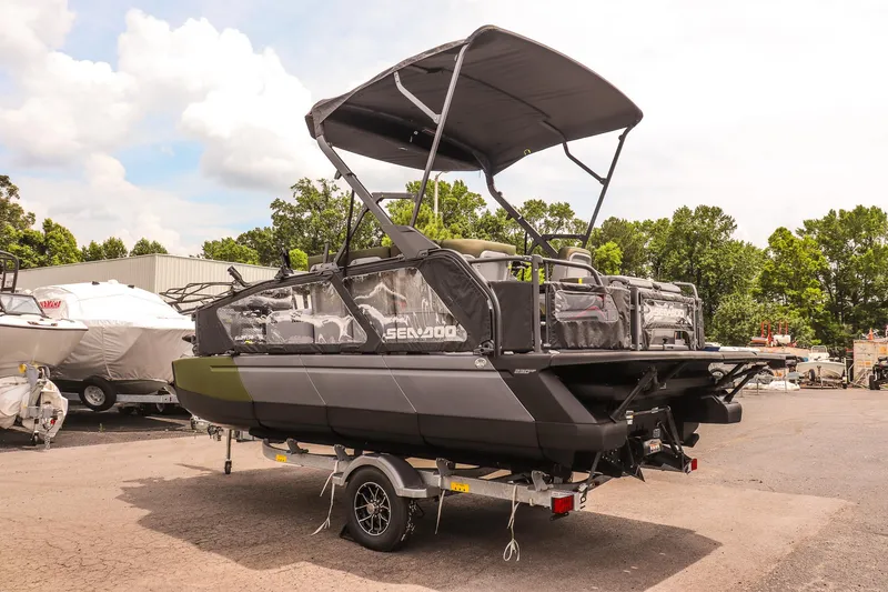Slide: The Image of 2025 Sea-Doo Switch Fish 18-230 HP boat on trailer, parked outdoors. - 5