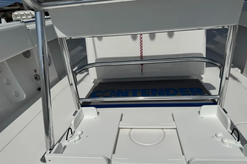Slide: The Image of 2024 Contender 28 Tournament boat interior with branded flooring and stainless steel railing. - 9