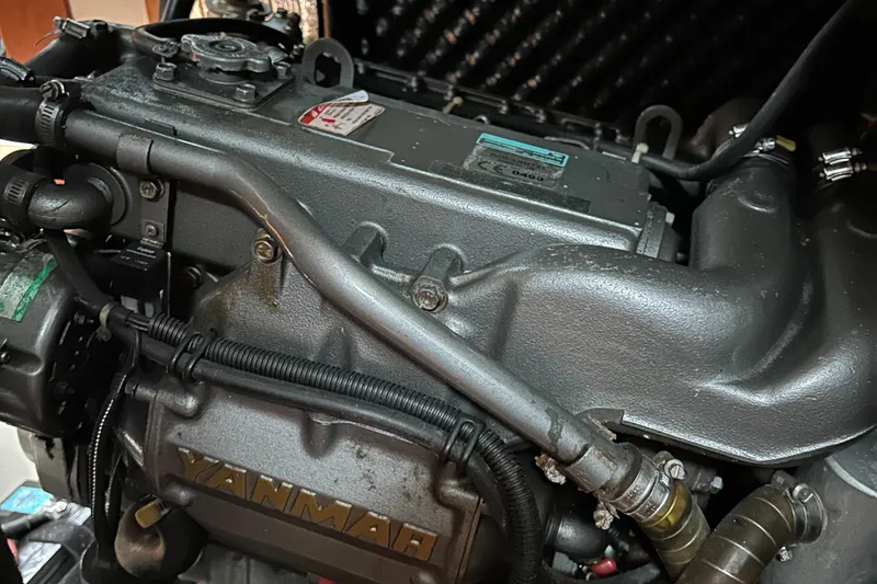 Slide: The Image of Engine of a 2007 Beneteau Cyclades 50.3 sailboat, featuring Yanmar components. - 13