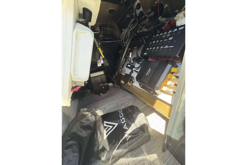 Slide: The Image of Interior view of 2026 Viaggio Diamante UWA showcasing electronic components and wiring. - 15