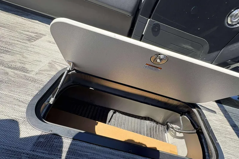 Slide: The Image of Open storage compartment in 2026 Viaggio Diamante UWA boat, showcasing interior space. - 23