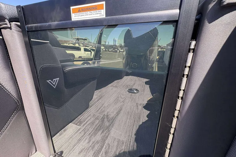 Slide: The Image of Interior view of 2026 Viaggio Diamante UWA boat with warning label and seating. - 27