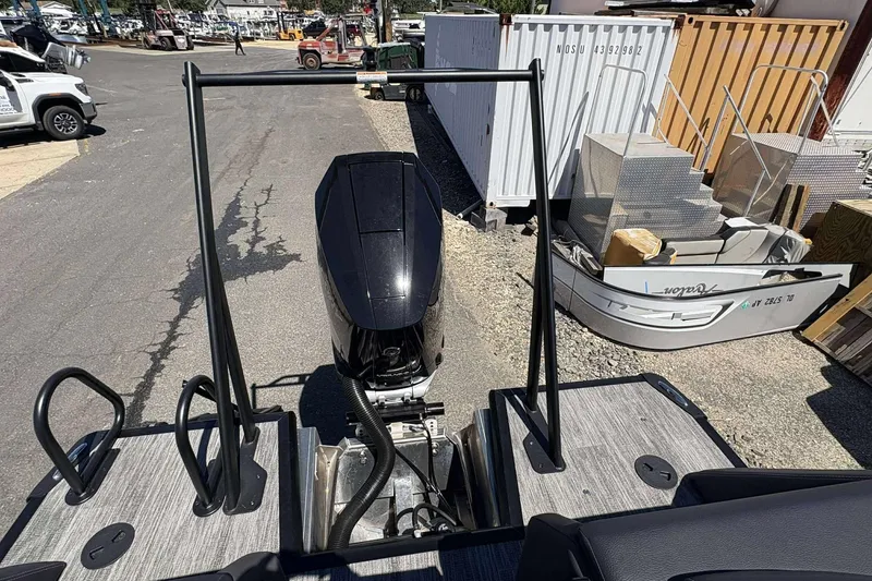 Slide: The Image of Rear view of a 2026 Viaggio Diamante UWA boat with an outboard motor. - 29