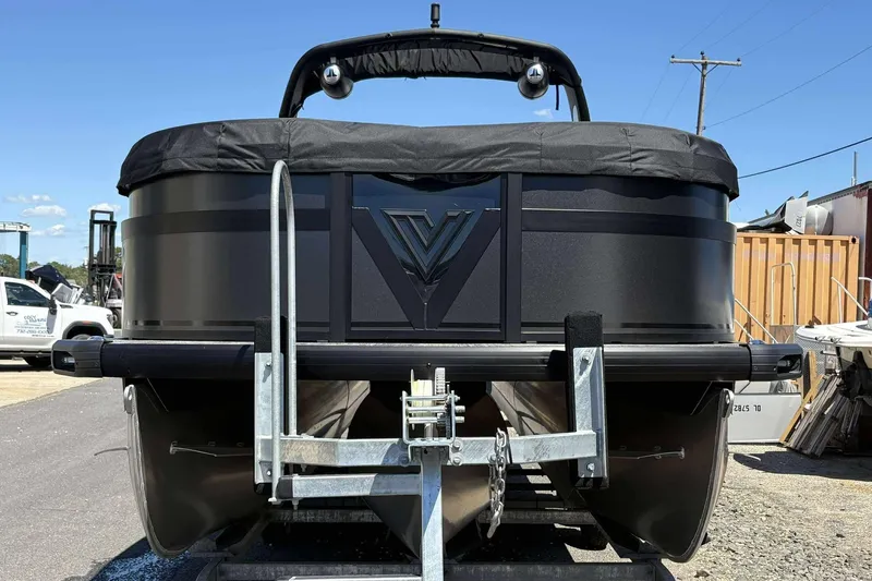 Slide: The Image of 2026 Viaggio Diamante UWA pontoon boat on trailer, rear view, outdoors. - 3