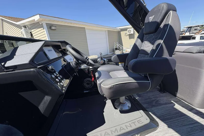 Slide: The Image of Viaggio Diamante UWA 2026 boat cockpit with luxury captain's chair and control panel. - 7