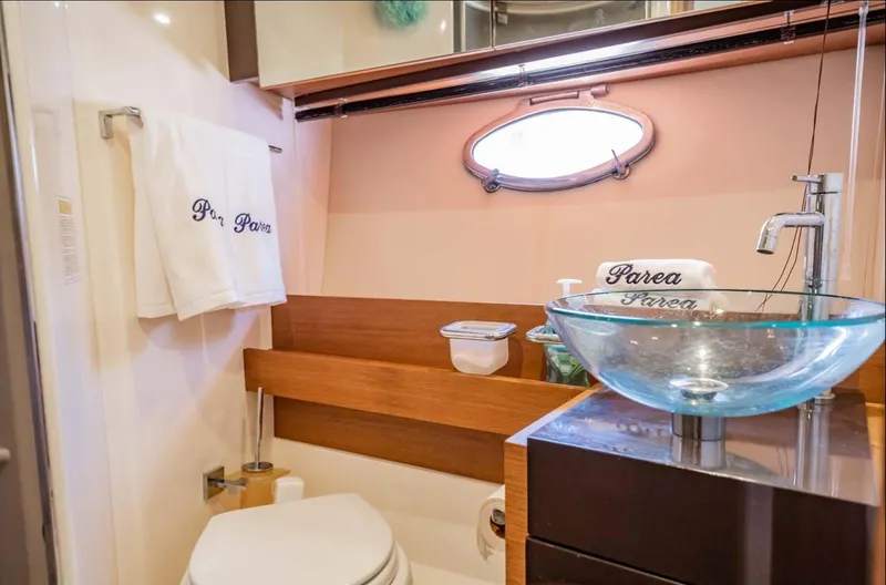 Slide: The Image of Luxurious bathroom in 2011 Azimut Atlantis 40 yacht with glass sink and elegant decor. - 17