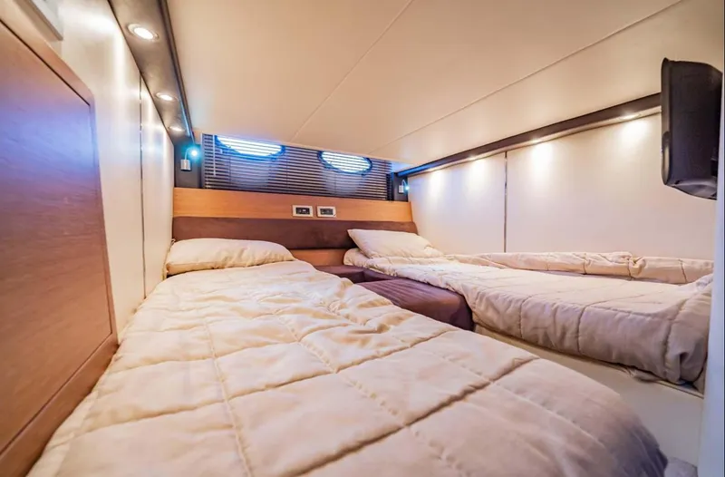 Slide: The Image of Luxurious cabin interior of 2011 Azimut Atlantis 40 yacht with twin beds. - 20