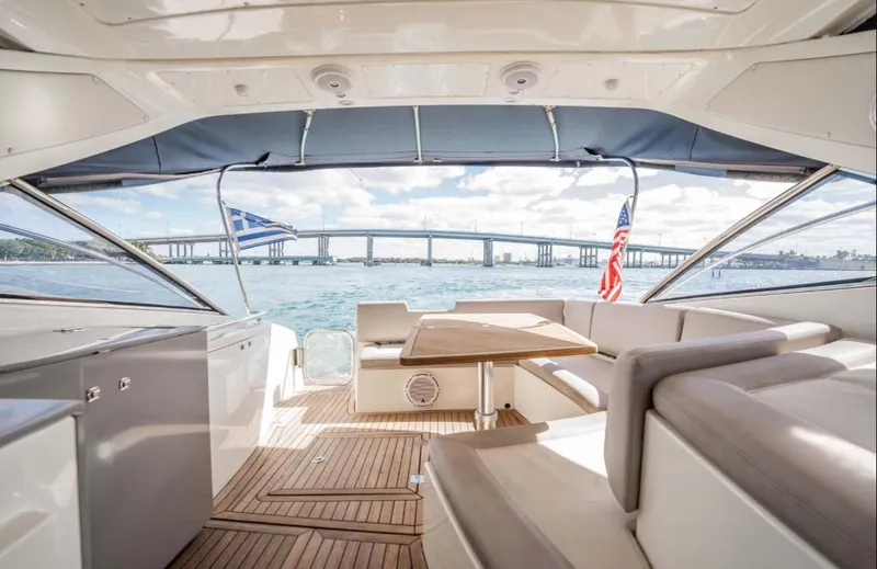 Slide: The Image of Luxurious 2011 Azimut Atlantis 40 yacht interior with scenic ocean view and bridge in background. - 28
