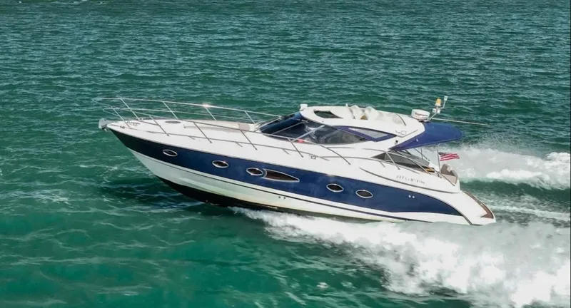 Slide: The Image of Azimut Atlantis 40 yacht cruising on open water, 2011 model, sleek design. - 34