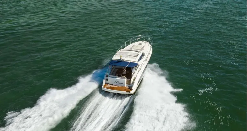 Slide: The Image of 2011 Azimut Atlantis 40 yacht cruising on open water. - 36