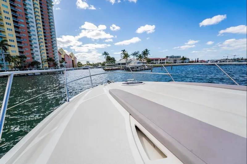 Slide: The Image of Azimut Atlantis 40 yacht cruising near colorful waterfront buildings, 2011 model. - 6