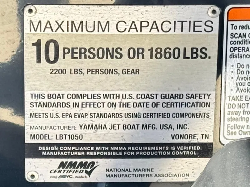 Slide: The Image of Yamaha SX210 2021 capacity plate: 10 persons or 1860 lbs, U.S. Coast Guard compliant. - 29