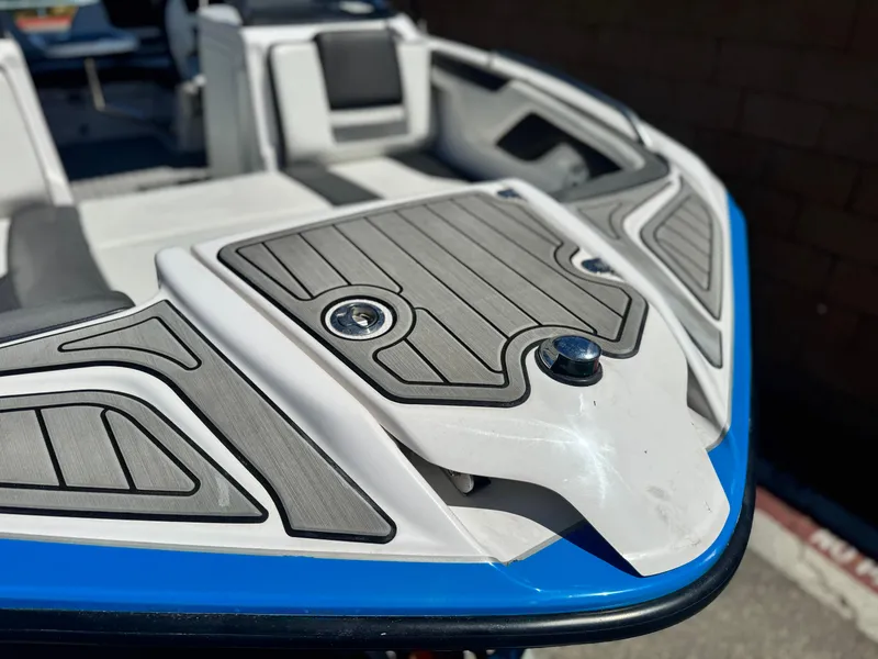 Slide: The Image of 2021 Yamaha Boats SX210 bow with sleek design and modern detailing. - 9