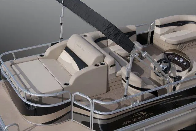 Slide: The Image of Manufacturer Provided Image: 2012 Bennington 24 SSL pontoon boat with beige and black seating. - 8