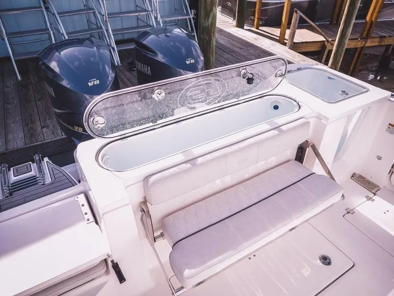 Slide: The Image of 2021 Sea Fox 328 Commander boat with Yamaha V8 engines at dock. - 9