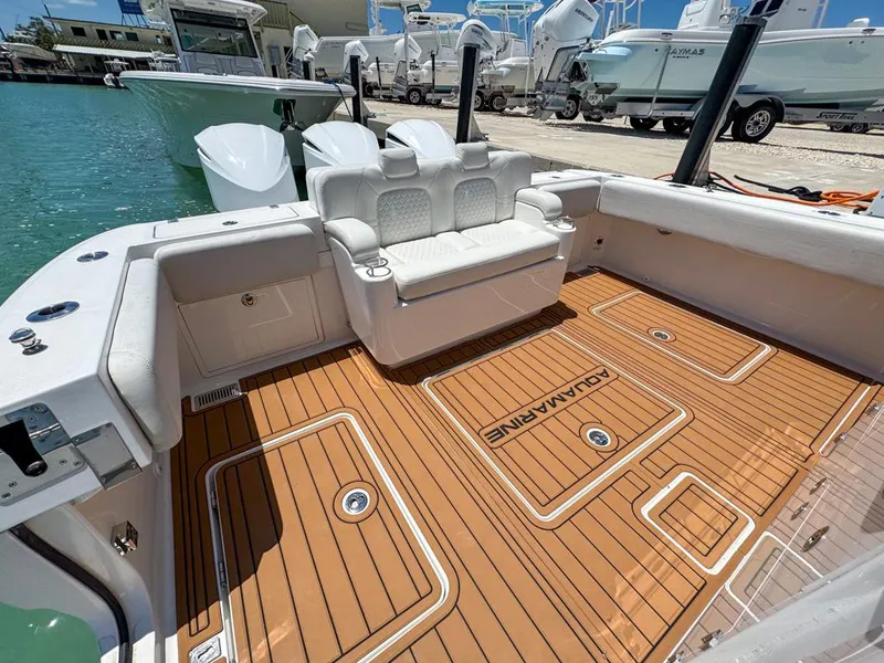Slide: The Image of 2019 HCB 39 Speciale boat with teak deck and white seating. - 10