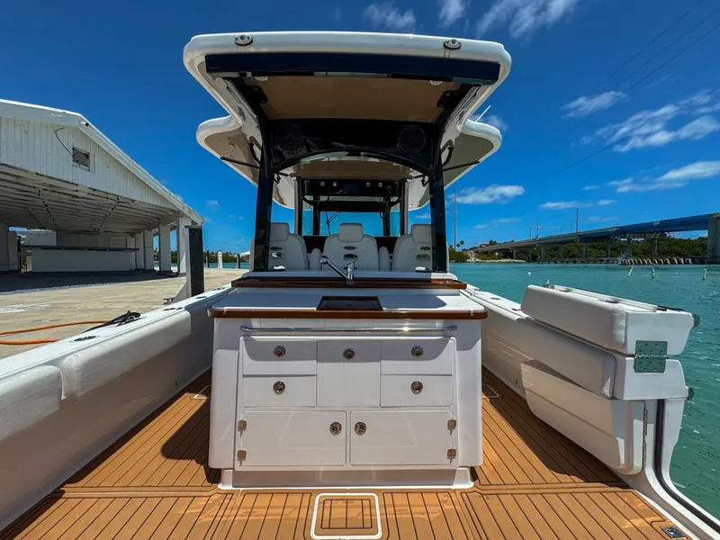 Slide: The Image of 2019 HCB 39 Speciale boat with teak deck and sleek design at marina. - 14