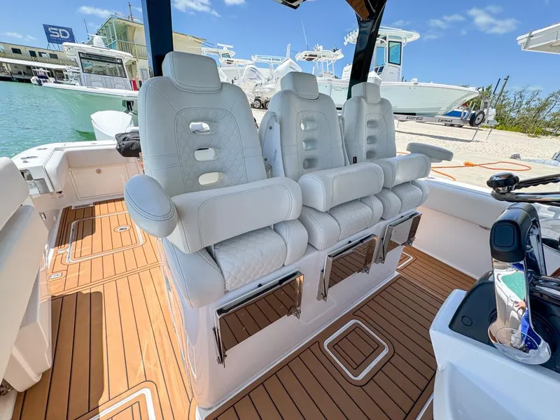 Slide: The Image of Luxurious seating on 2019 HCB 39 Speciale boat with teak flooring. - 20