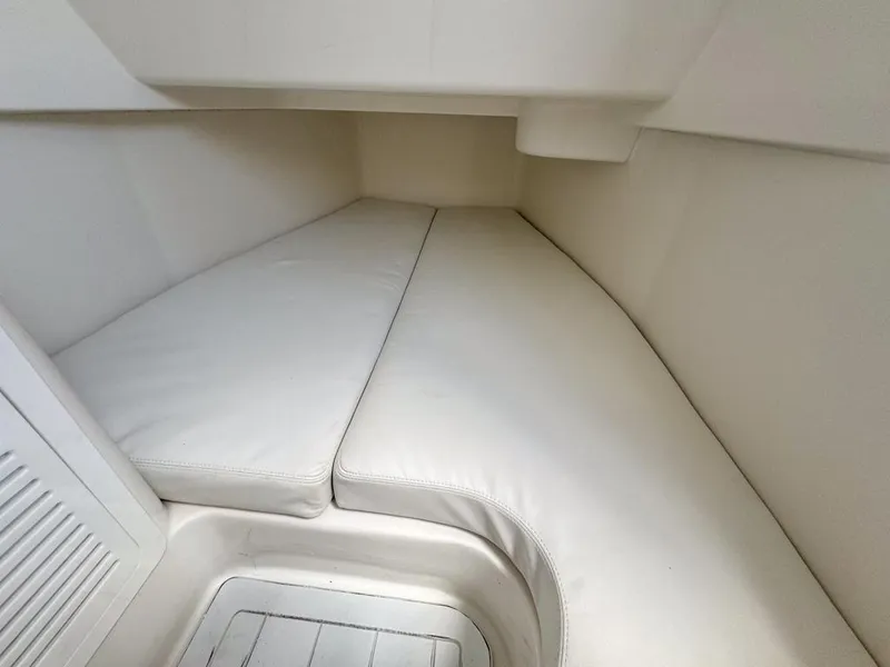 Slide: The Image of Interior cabin of 2019 HCB 39 Speciale with white cushioned seating. - 25