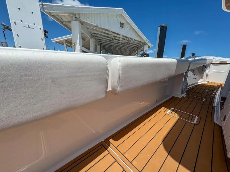 Slide: The Image of 2019 HCB 39 Speciale boat deck with cushioned side rail and wooden flooring. - 32