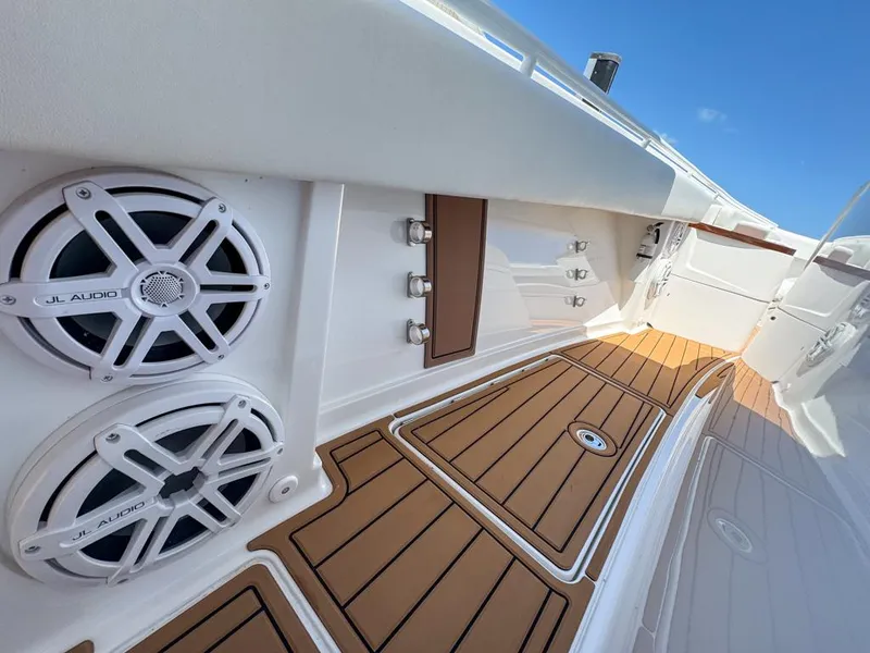 Slide: The Image of 2019 HCB 39 Speciale boat interior with teak flooring and JL Audio speakers. - 33