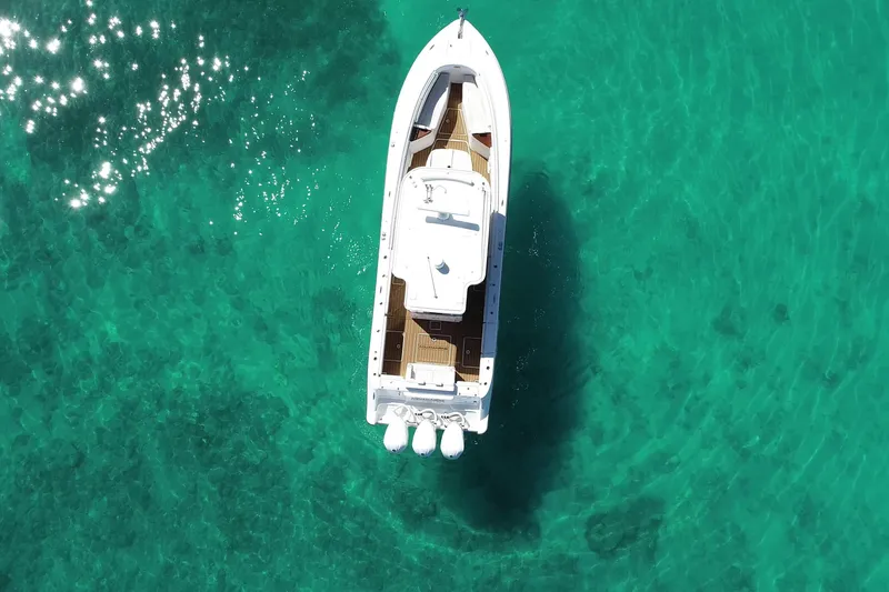 Slide: The Image of Aerial view of 2019 HCB 39 Speciale boat on clear turquoise water. - 38