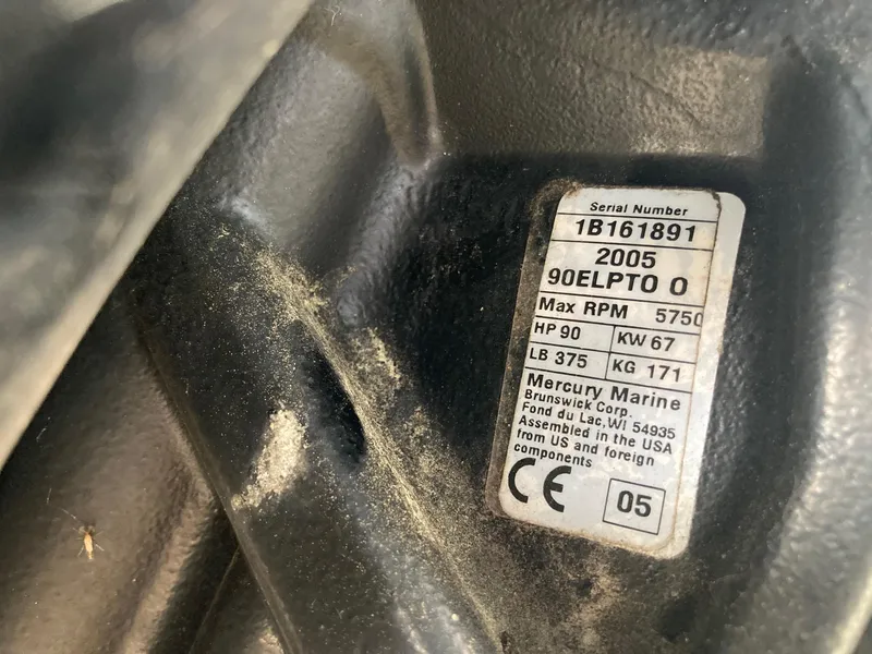 Slide: The Image of Label on Mercury Marine engine, serial number 1B161891, 90 HP, 2005 model. - 12