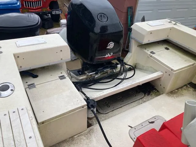 Slide: The Image of 1995 KenCraft Challenger 190 boat with 90 HP outboard motor, rear view. - 9