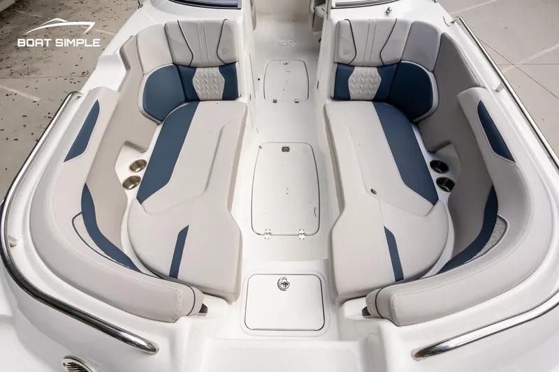 Slide: The Image of 2025 Hurricane SunDeck 2400 OB boat interior with spacious seating and modern design. - 13