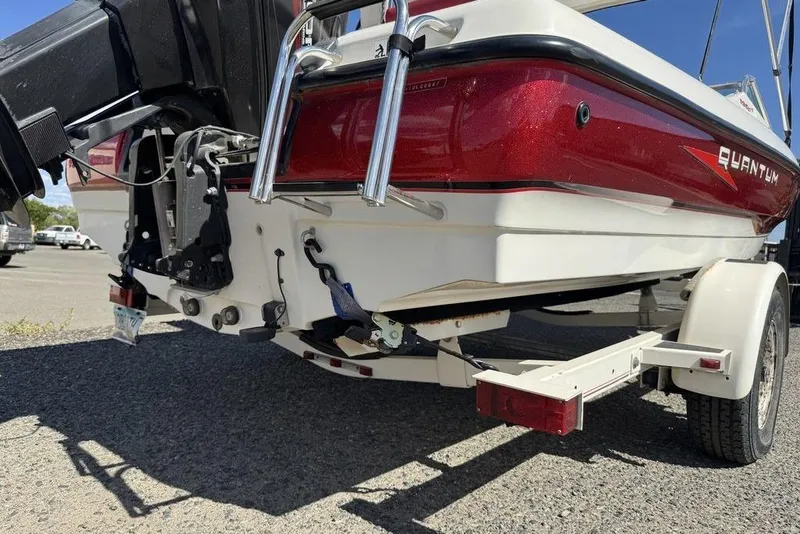 Slide: The Image of 1997 Bayliner Quantum 190 XFS boat on trailer, rear view, red and white design. - 38