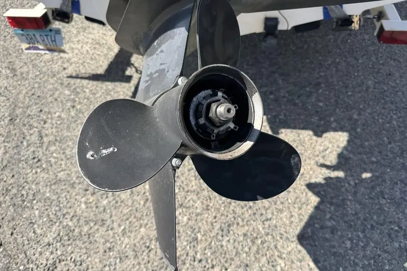 Slide: The Image of Propeller of a 1997 Bayliner Quantum 190 XFS boat on a trailer. - 7