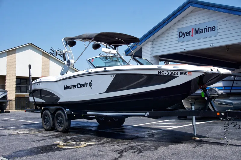 Slide: The Image of 2018 MasterCraft X46 boat on trailer at Dyer Marine dealership. - 3