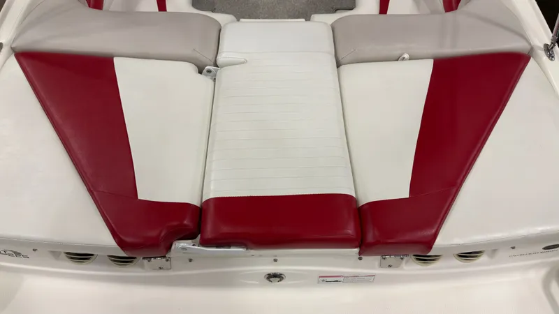 Slide: The Image of Red and white seating of a 2008 Glastron GT 225 boat. - 5