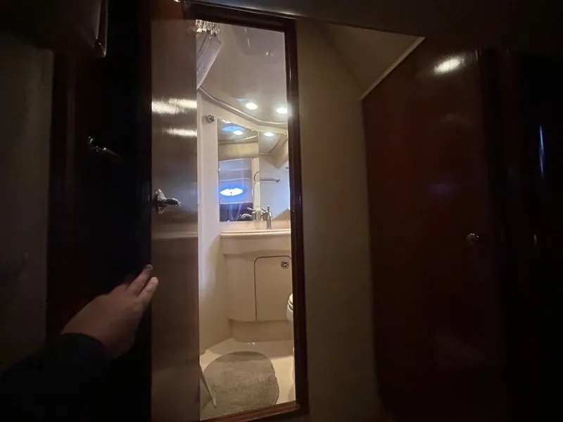 Slide: The Image of Interior view of 2005 Meridian Gone Dingy 411 Sedan bathroom with open door. - 11