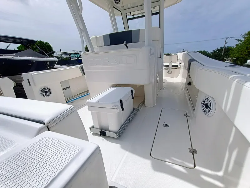 Slide: The Image of 2025 Robalo R270 Center Console boat interior with seating and storage. - 7