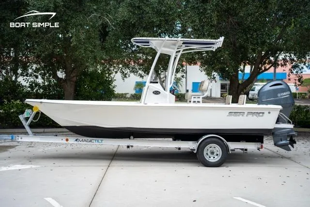Slide: The Image of 2024 Sea Pro 208 Bay boat on trailer, side view, with Yamaha outboard motor. - 7