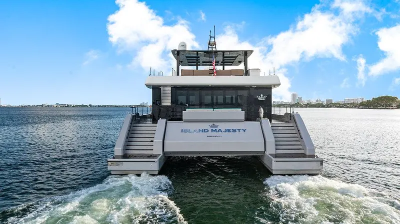 Slide: The Image of Luxury Sunreef 70 yacht "Island Majesty" cruising on open water, 2018 model. - 10