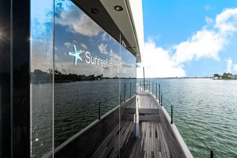 Slide: The Image of Sunreef 70 yacht deck with scenic water view, 2018 model. - 48