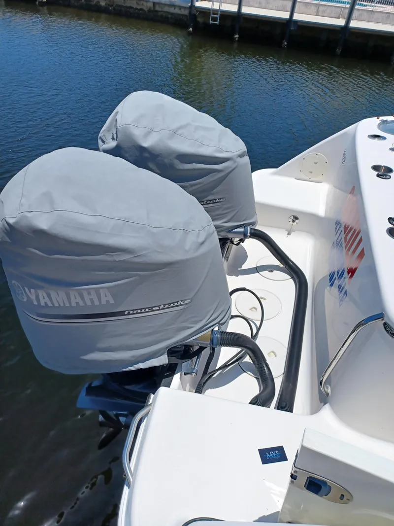 Slide: The Image of 2016 Robalo R300 Center Console with Yamaha engines, docked. - 7