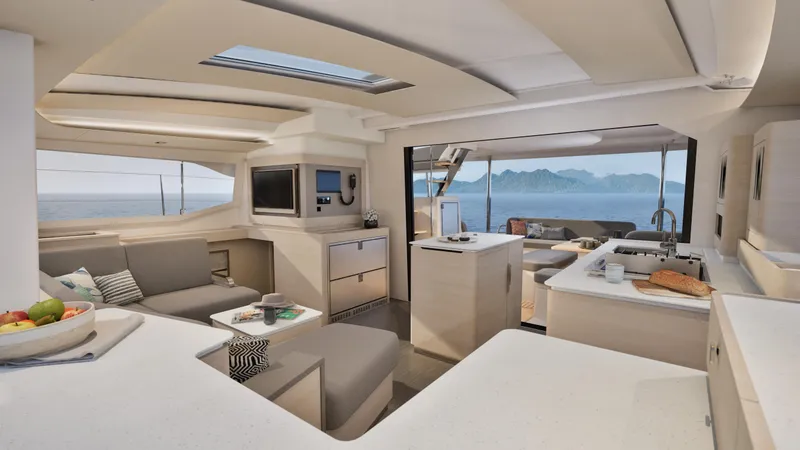 Slide: The Image of Luxurious interior of 2026 Fountaine Pajot 44 catamaran with modern kitchen and ocean view. - 18